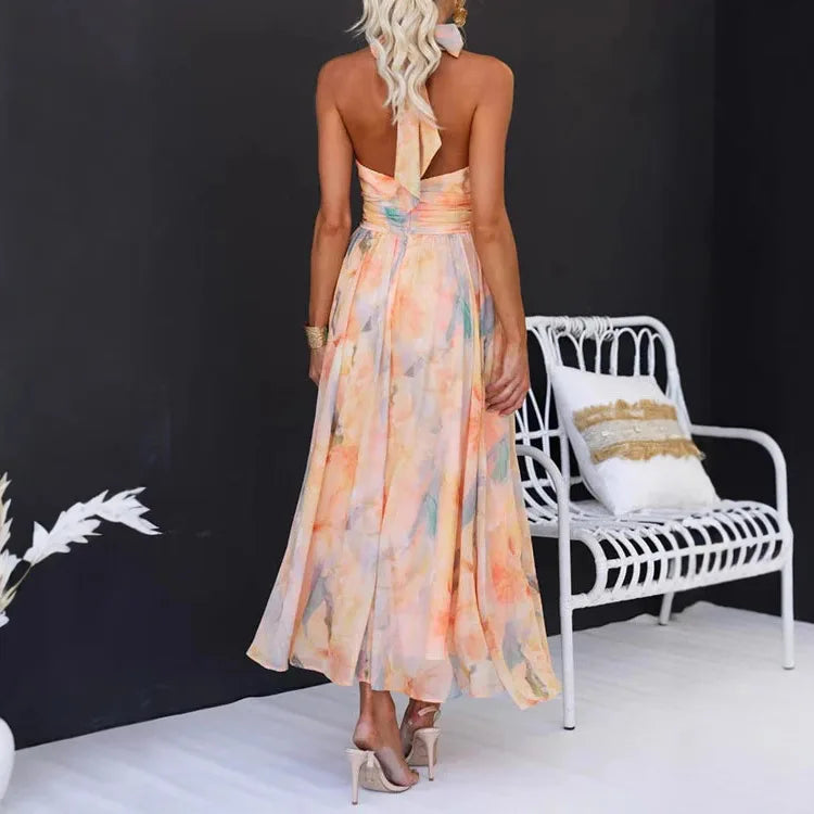 Abito lungo da donna senza schienale con spalline floreali e scollo all'americana in colore dopamina, stile temperamento, abito estivo da spiaggia di alta qualità per il mare