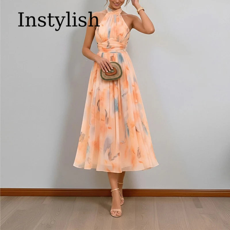 Abito lungo da donna senza schienale con spalline floreali e scollo all'americana in colore dopamina, stile temperamento, abito estivo da spiaggia di alta qualità per il mare