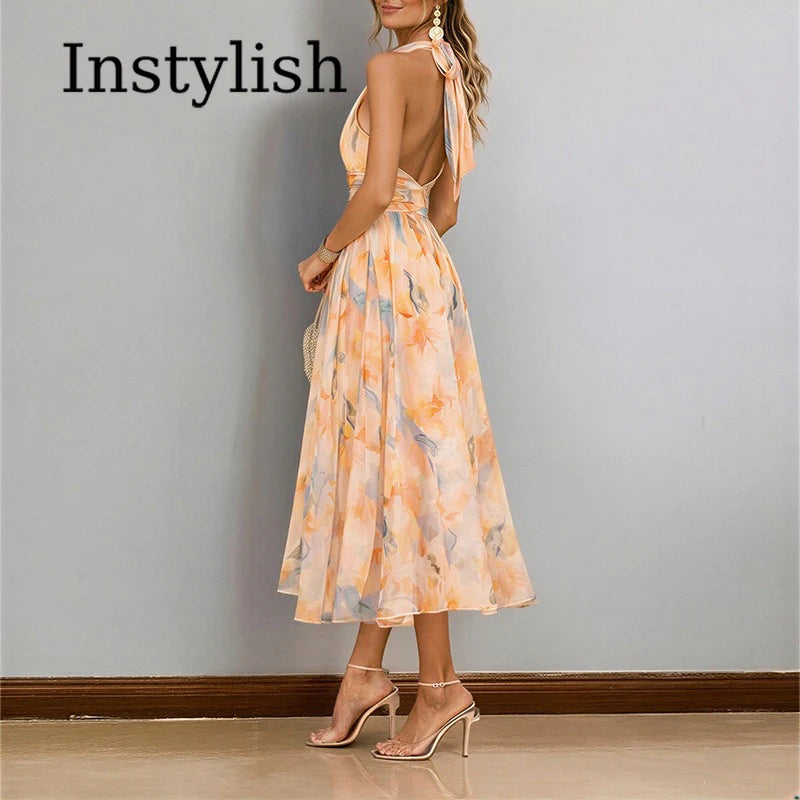 Abito lungo da donna senza schienale con spalline floreali e scollo all'americana in colore dopamina, stile temperamento, abito estivo da spiaggia di alta qualità per il mare