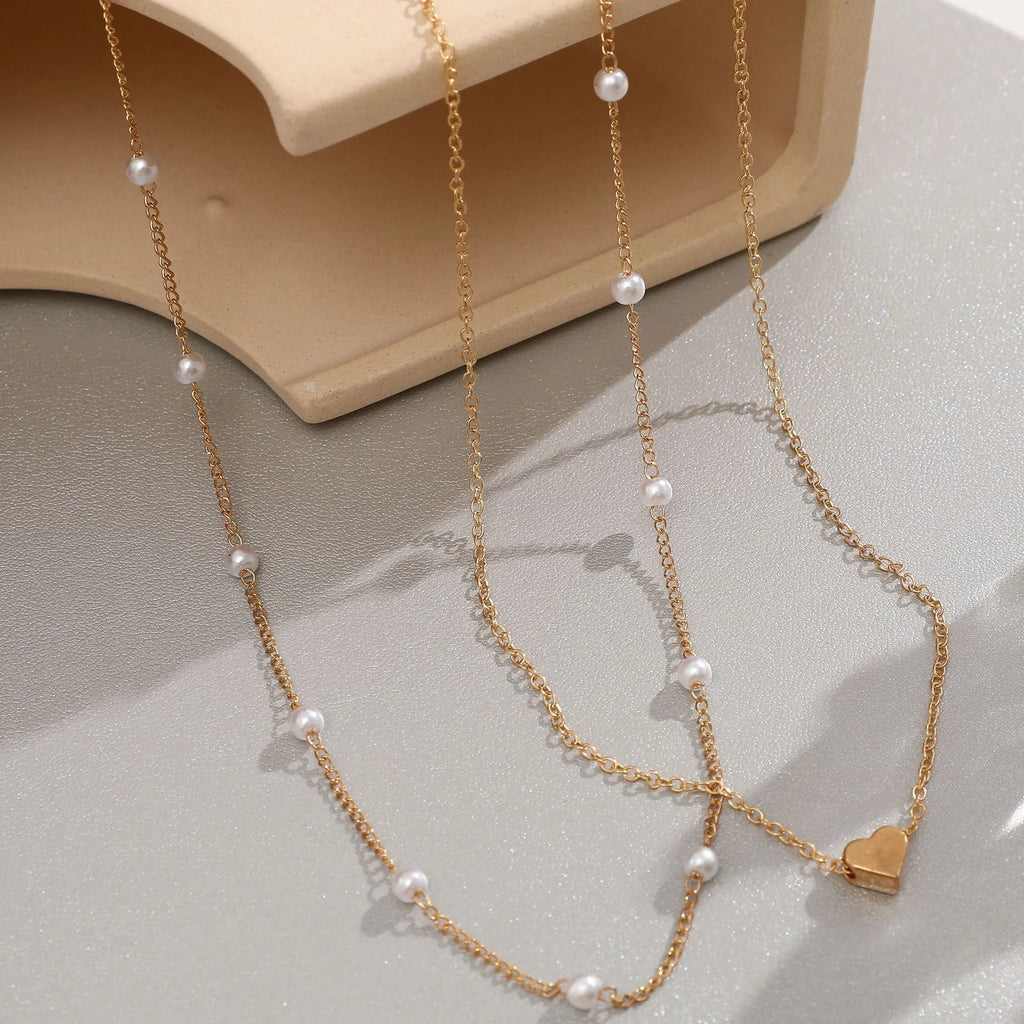 LATS Collane con Ciondolo a Cuore d'Amore a Croce in Perle Multistrato per Donna Colore Oro Moda Catena Clavicola Tendenza Gioielli 2024