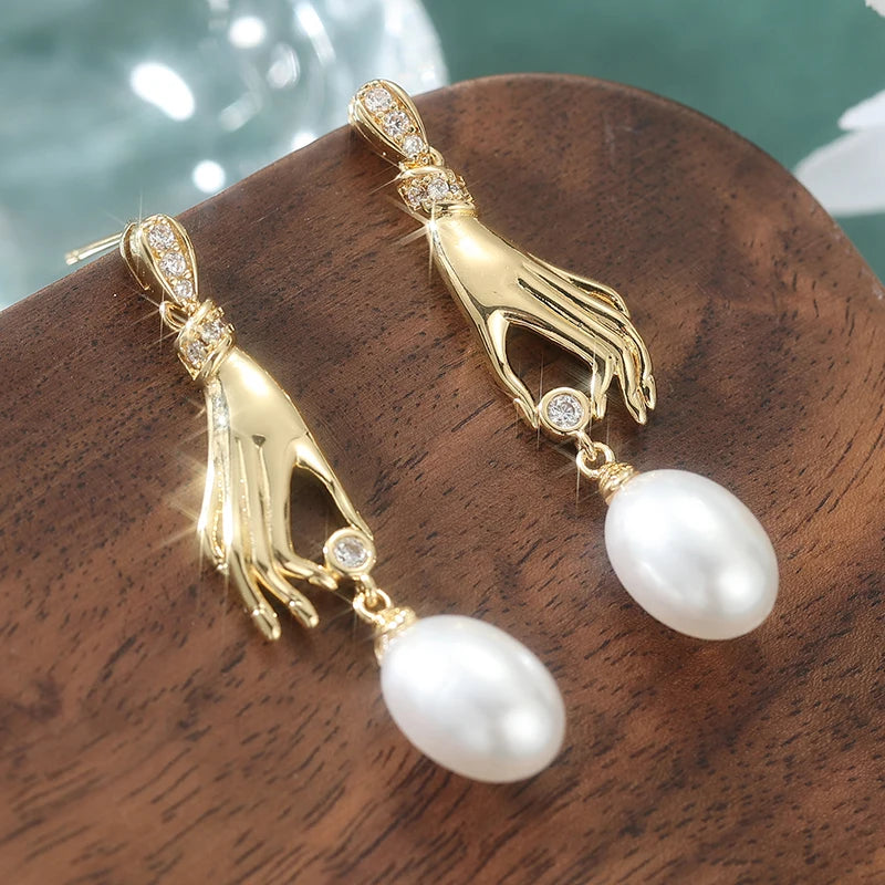 Orecchini pendenti da donna con perla finta, dal design creativo a mano, accessorio di personalità alla moda, gioielli di temperamento per feste quotidiane